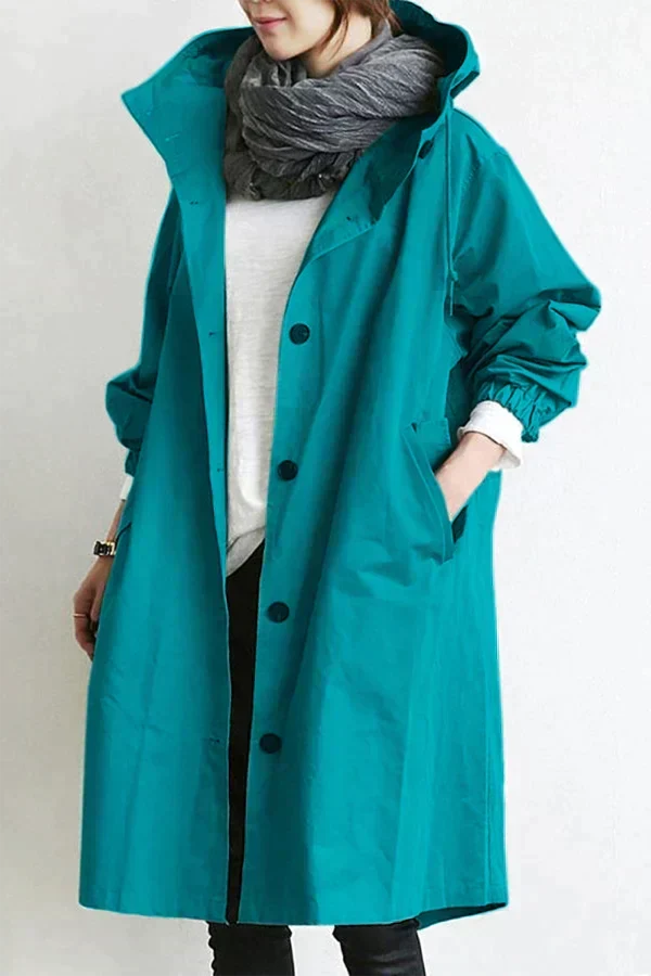 Women's long hooded raincoat with button front and side pockets
