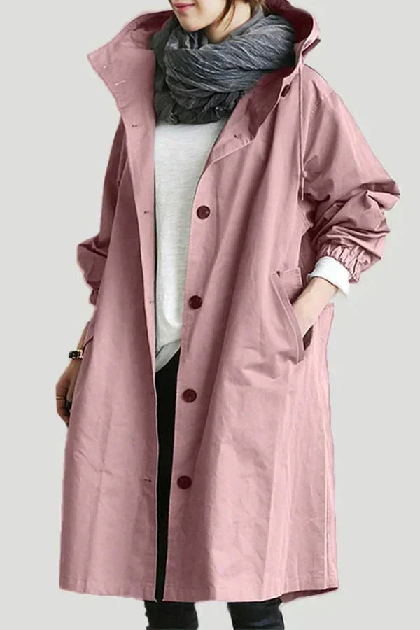 Women's long hooded raincoat with button front and side pockets