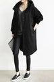 Women's long hooded raincoat with button front and side pockets