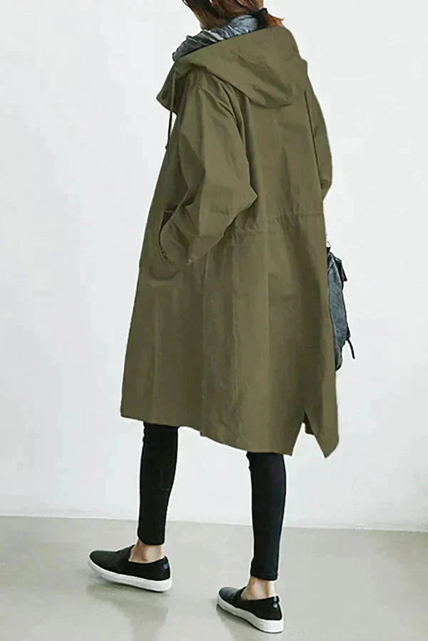 Women's long hooded raincoat with button front and side pockets