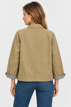 Women's short trench jacket with button front, patch pockets and checked turn-up cuffs