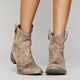 Women's vintage western ankle boots with pointed toes, pull tabs and block heels