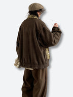 Women's brown plaid jacket with collar, long sleeves and button fastening
