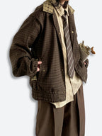 Women's brown plaid jacket with collar, long sleeves and button fastening