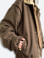 Women's brown plaid jacket with collar, long sleeves and button fastening