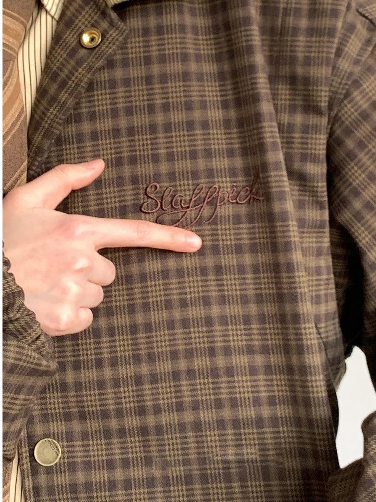 Women's brown plaid jacket with collar, long sleeves and button fastening