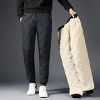 Women's quilted jogger trousers with drawstring waist, zipped pockets and ribbed ankle cuffs