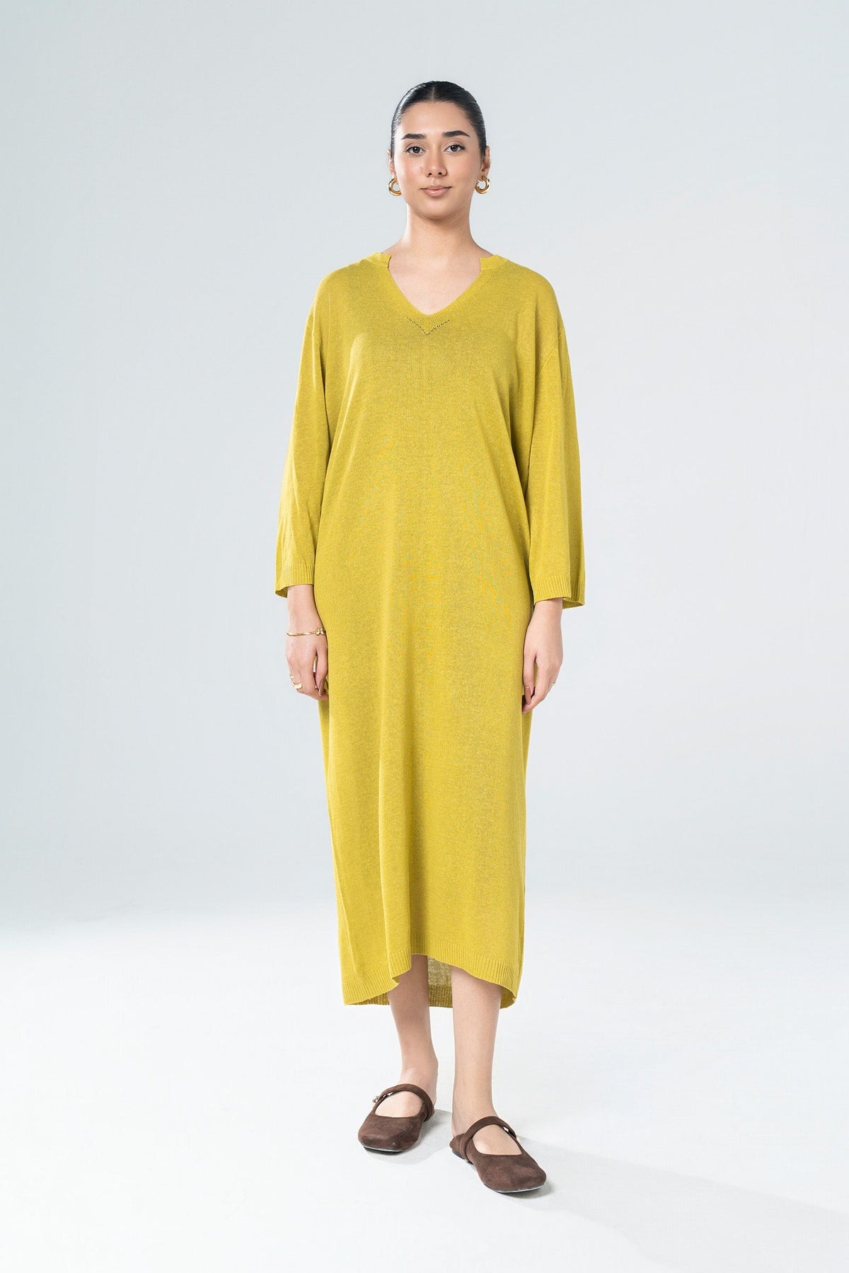 Women's yellow knit midi dress with V-neckline and 3/4 sleeves