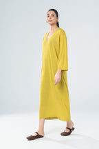 Women's yellow knit midi dress with V-neckline and 3/4 sleeves