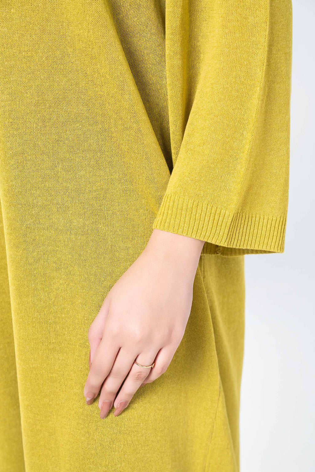 Women's yellow knit midi dress with V-neckline and 3/4 sleeves