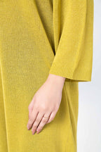 Women's yellow knit midi dress with V-neckline and 3/4 sleeves