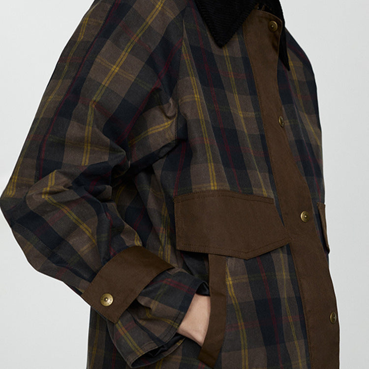 Women's plaid jacket with black faux fur collar and flap pockets