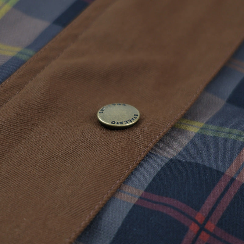 Women's plaid jacket with black faux fur collar and flap pockets