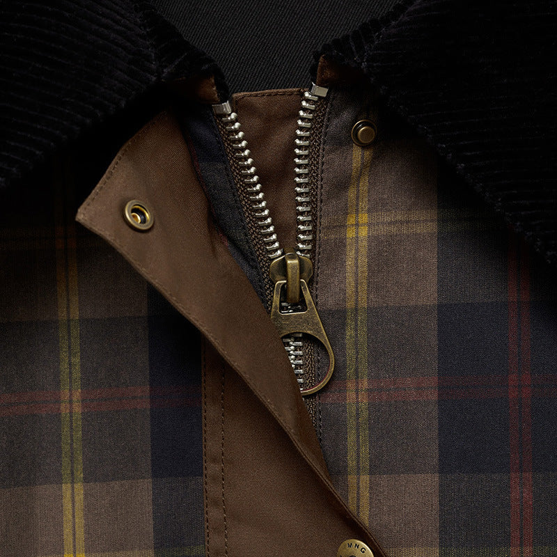 Women's plaid jacket with black faux fur collar and flap pockets