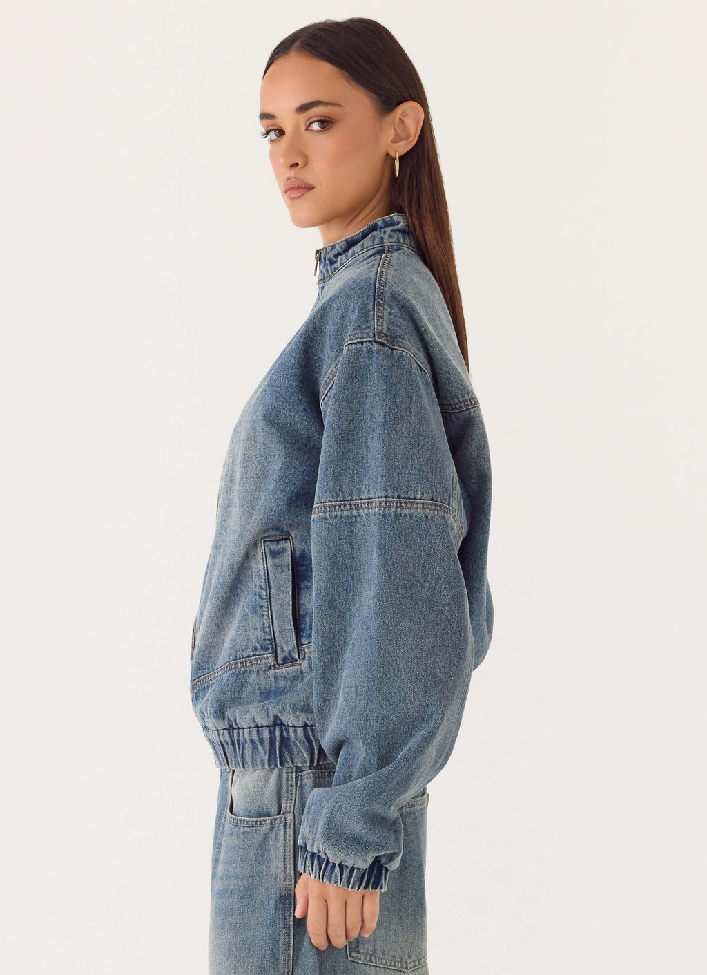Men's mid-wash blue denim bomber jacket