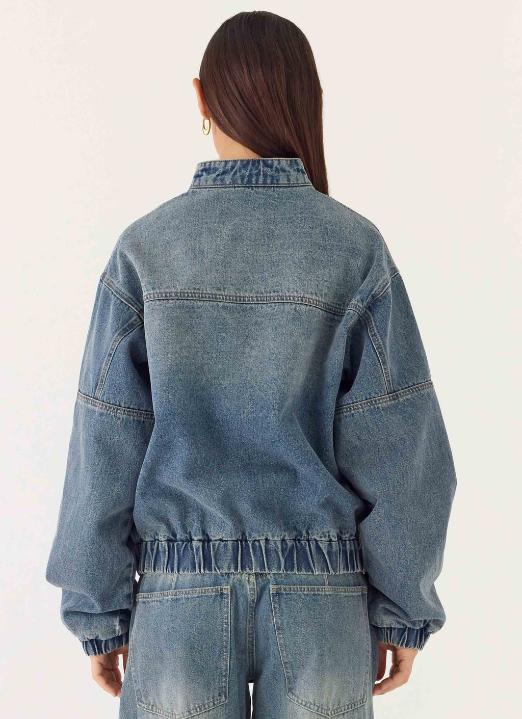 Men's mid-wash blue denim bomber jacket