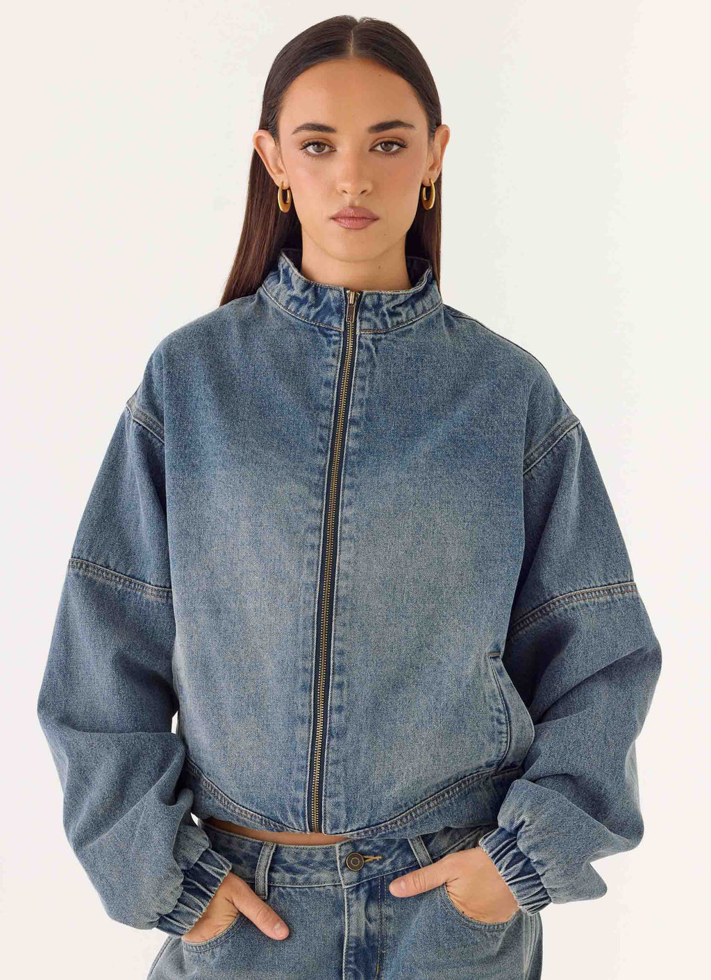 Men's mid-wash blue denim bomber jacket