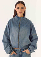 Men's mid-wash blue denim bomber jacket