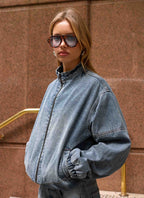 Men's mid-wash blue denim bomber jacket