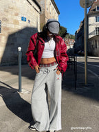 Black wide-leg jogger trousers with checked waistband and drawcords