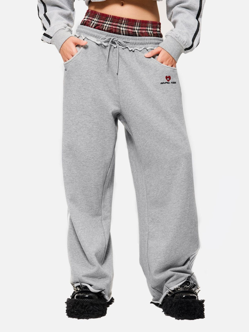 Black wide-leg jogger trousers with checked waistband and drawcords