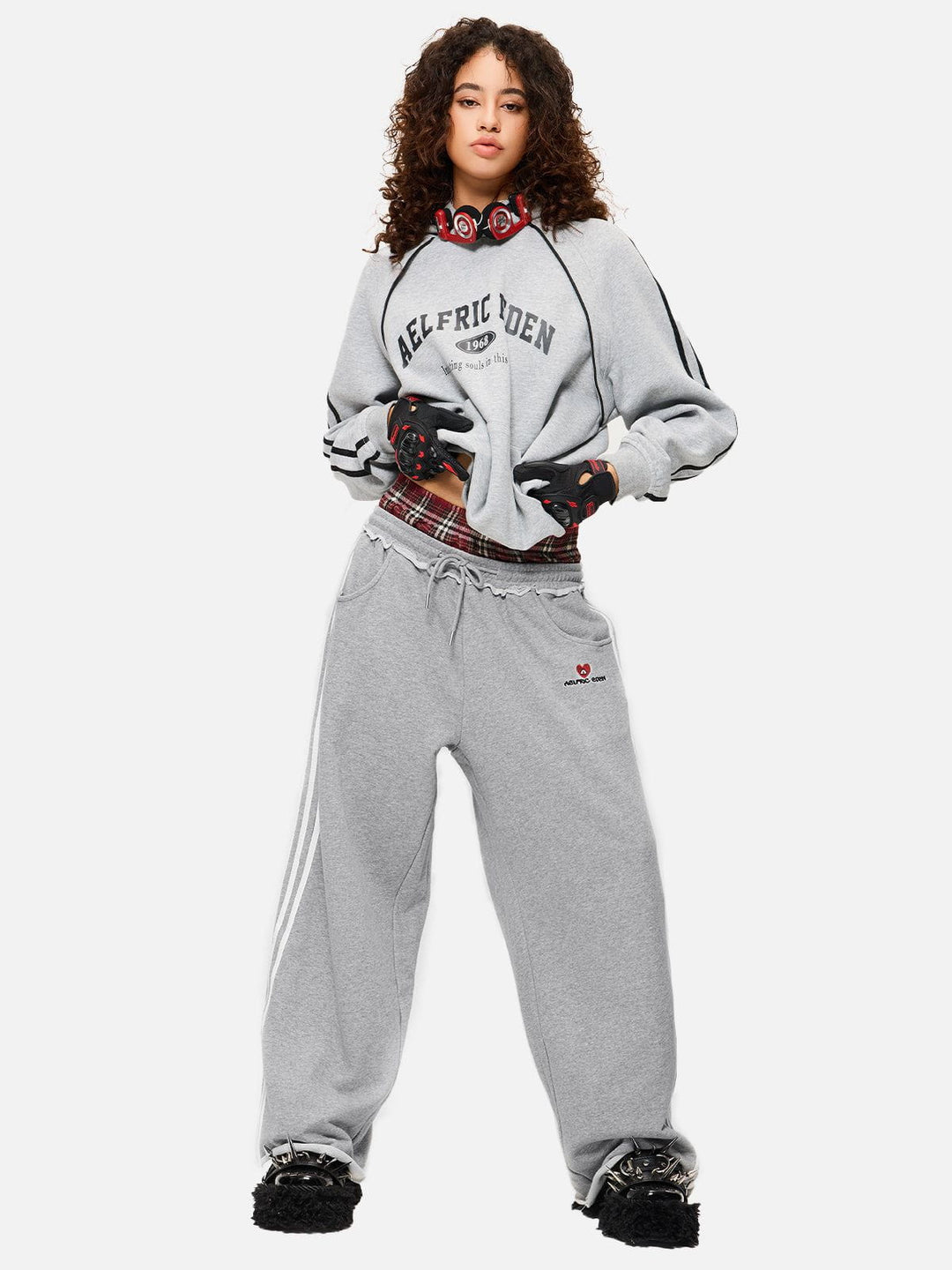 Black wide-leg jogger trousers with checked waistband and drawcords