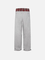 Black wide-leg jogger trousers with checked waistband and drawcords