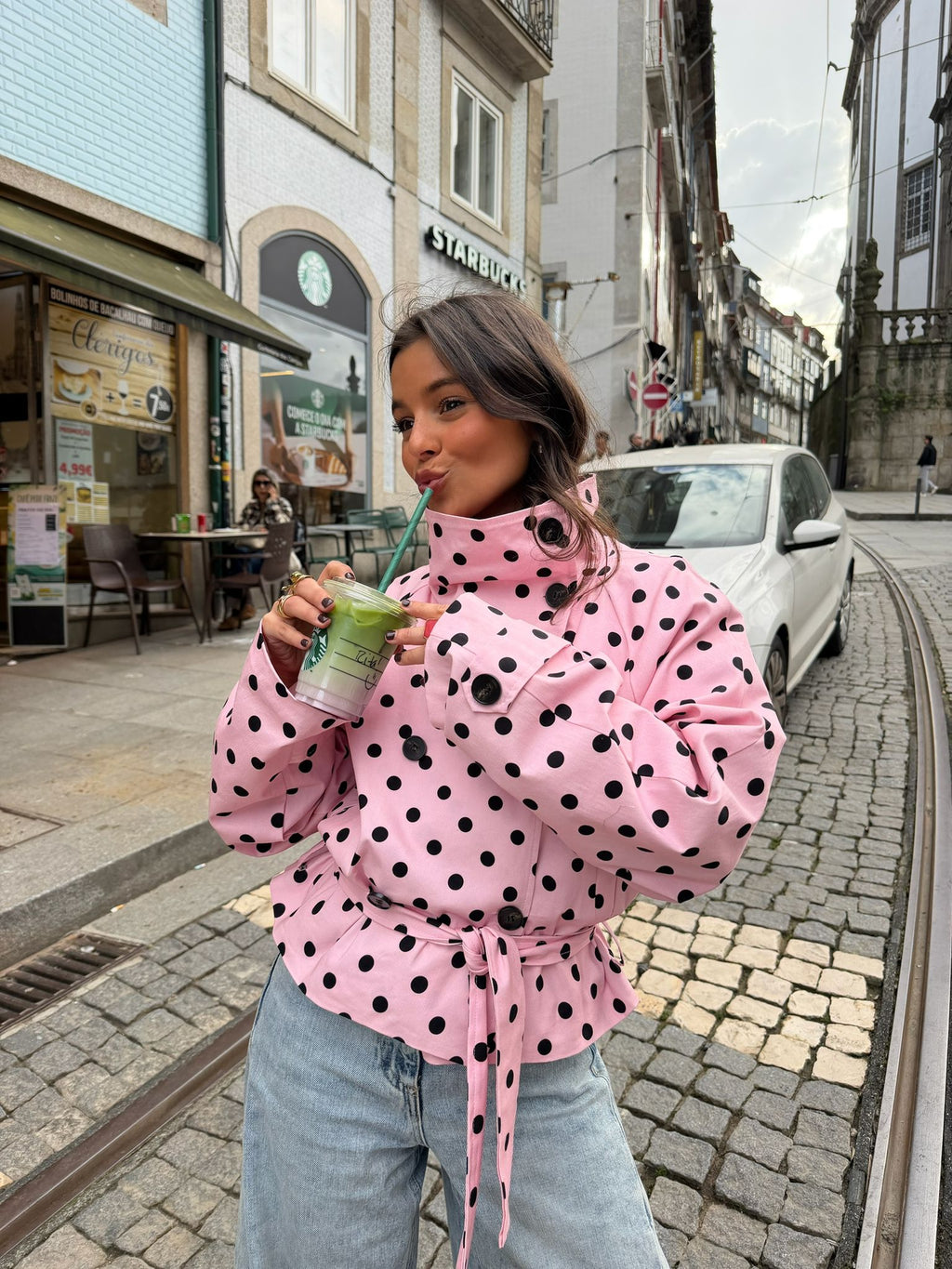 Women's pink cropped polka dot trench coat with high collar and waist tie