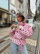 Women's pink cropped polka dot trench coat with high collar and waist tie