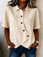 Women's short-sleeve button blouse with pointed collar and curved hem
