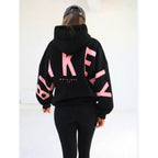 Women's graphic print hoodie with hood and bold back lettering