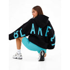 Women's graphic print hoodie with hood and bold back lettering