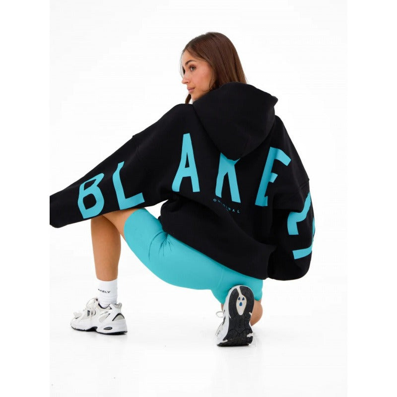 Women's graphic print hoodie with hood and bold back lettering