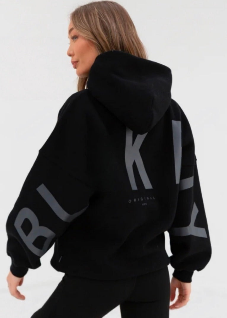 Women's graphic print hoodie with hood and bold back lettering