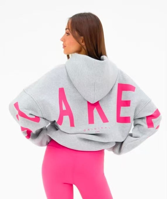 Women's graphic print hoodie with hood and bold back lettering