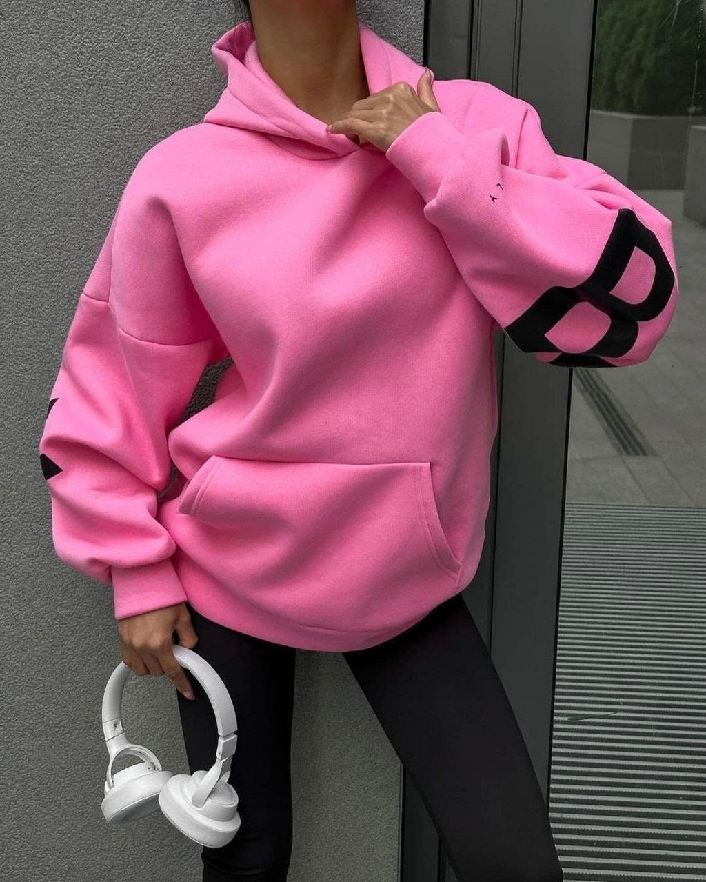 Women's graphic print hoodie with hood and bold back lettering