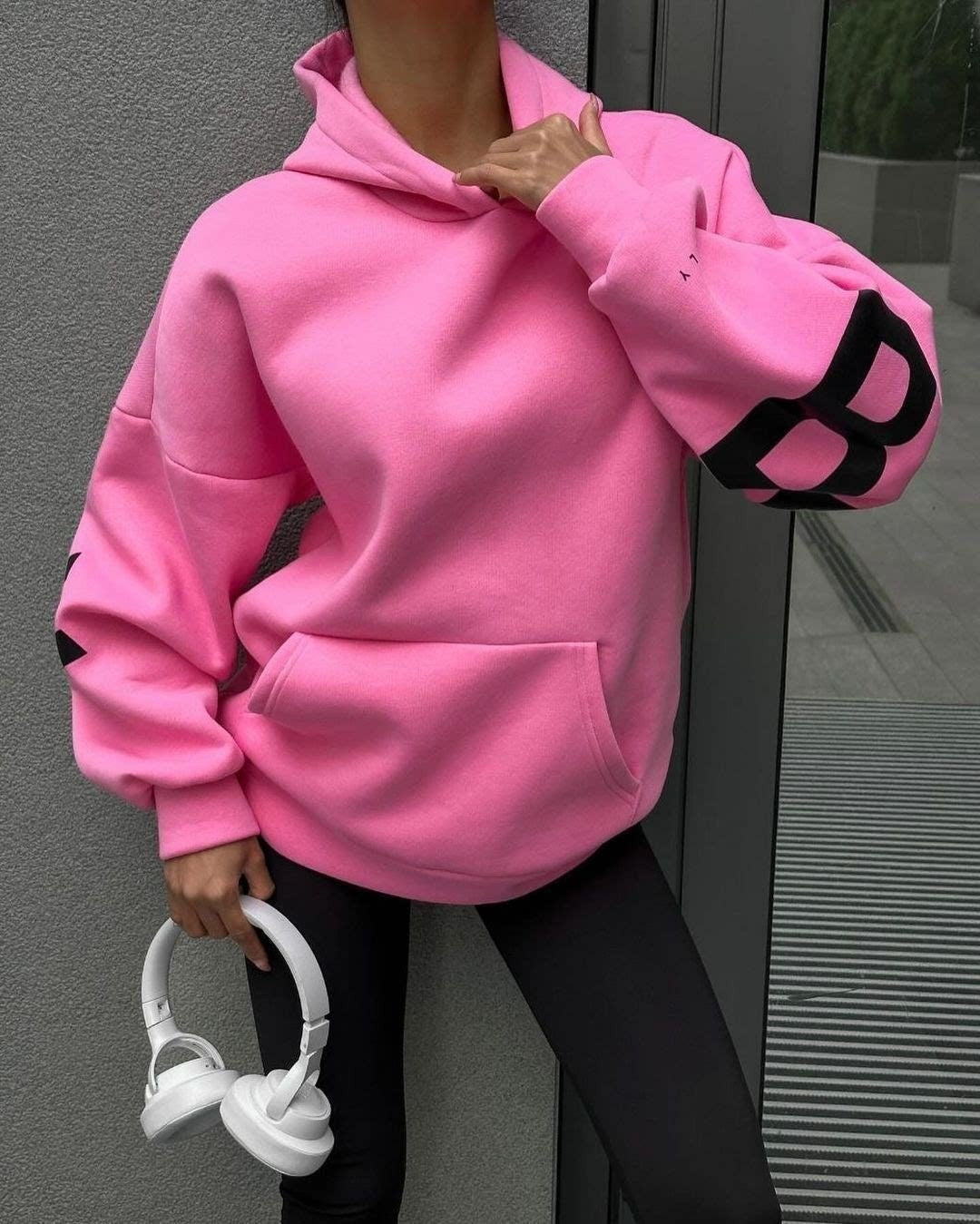 Women's graphic print hoodie with hood and bold back lettering