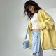 Women's oversized cable knit cardigan with buttons and embroidered motifs