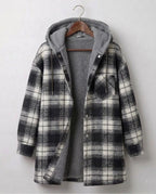 Women's plaid hooded shacket with long sleeves and front pockets