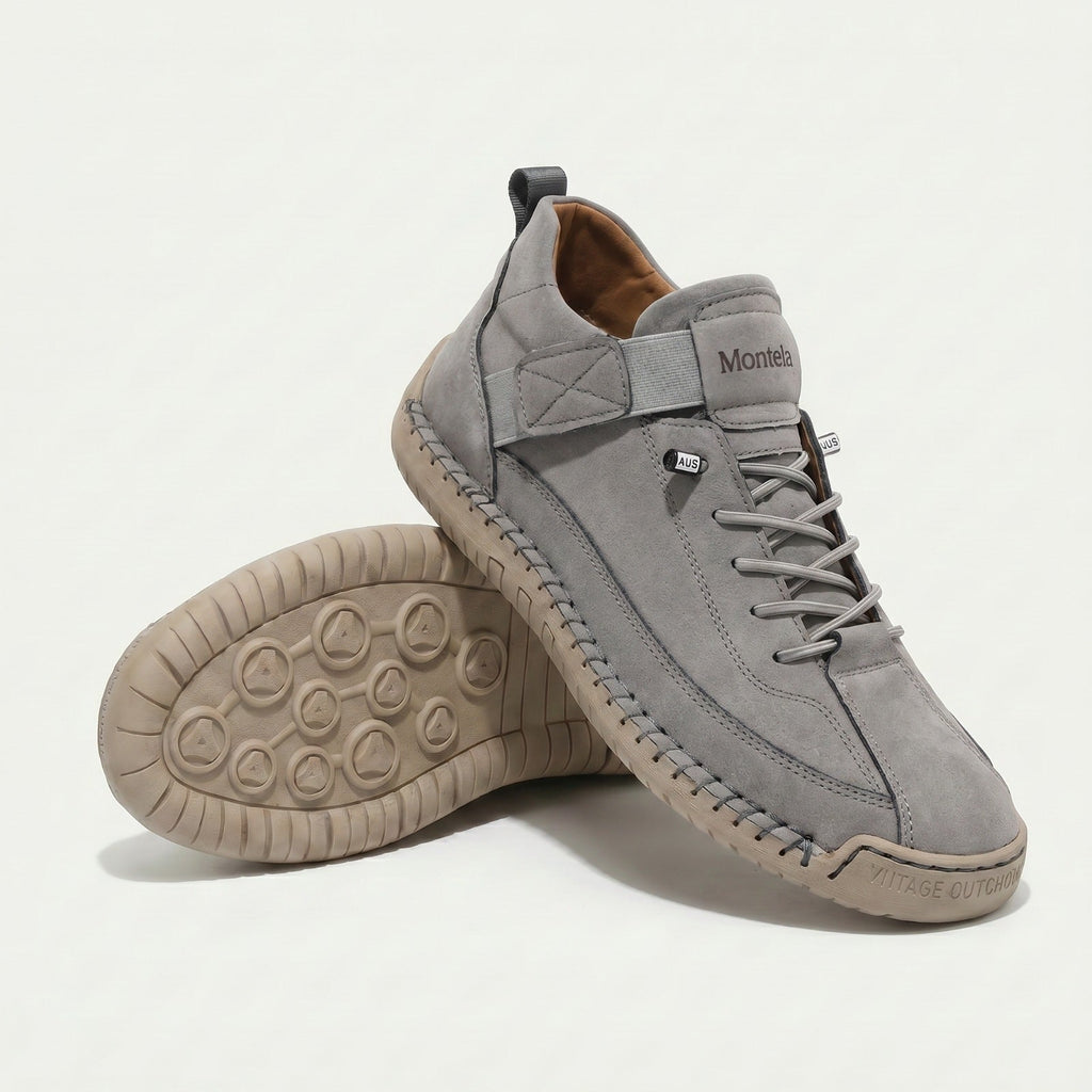 High-top lace-up sneakers with side strap detail and textured flat soles