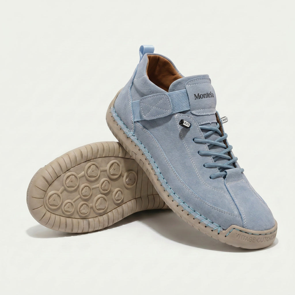 High-top lace-up sneakers with side strap detail and textured flat soles