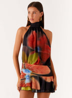 Women's multicolor floral halter mini dress with ruffle hem