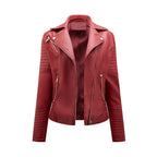 Women's short biker jacket with notched lapels, long sleeves, zip pockets and quilted panels