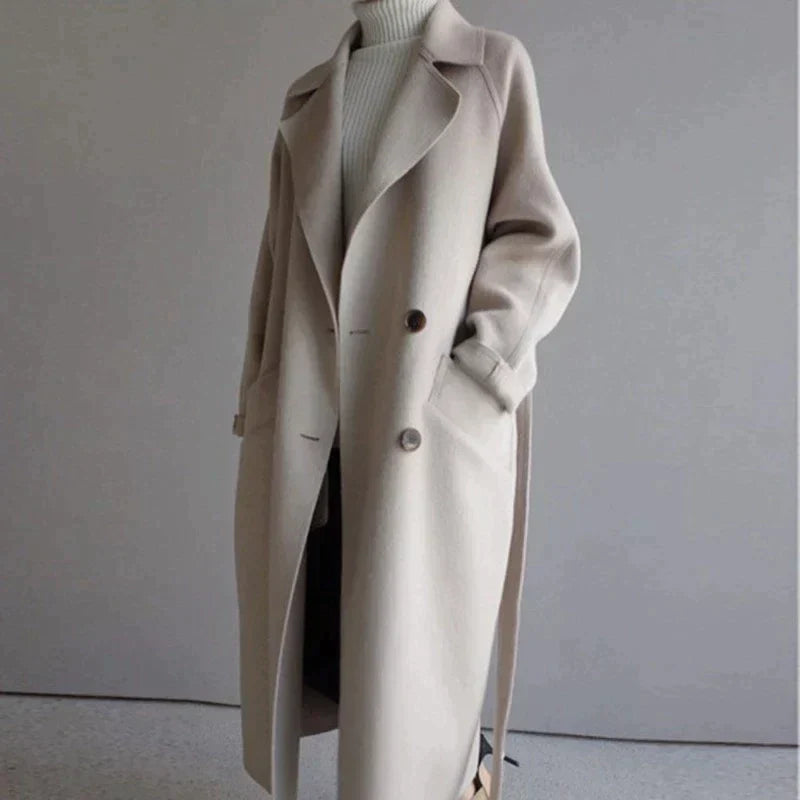 Women's long trench coat with lapels, belt and double-breasted buttons