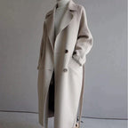 Women's long trench coat with lapels, belt and double-breasted buttons