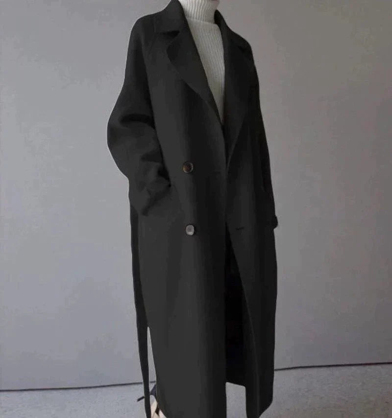 Women's long trench coat with lapels, belt and double-breasted buttons