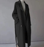 Women's long trench coat with lapels, belt and double-breasted buttons