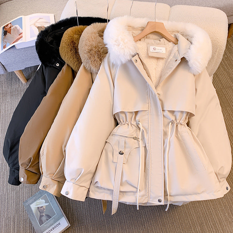 Women's hooded winter jacket with faux fur trim and drawstring waist