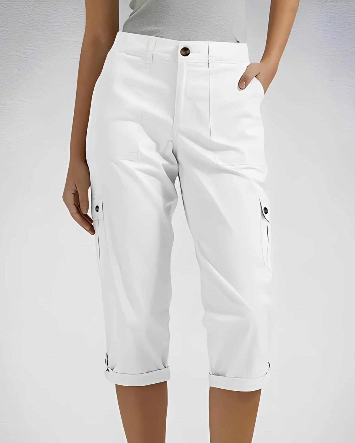 Women's high-waisted cropped cargo trousers with straight legs and multiple flap pockets