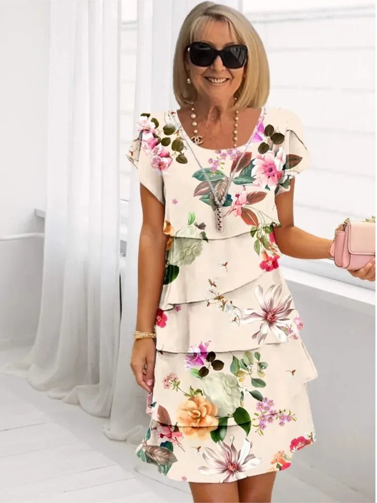 Women's apricot floral tiered mini dress with scoop neck and short sleeves